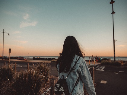 girl walking backpack